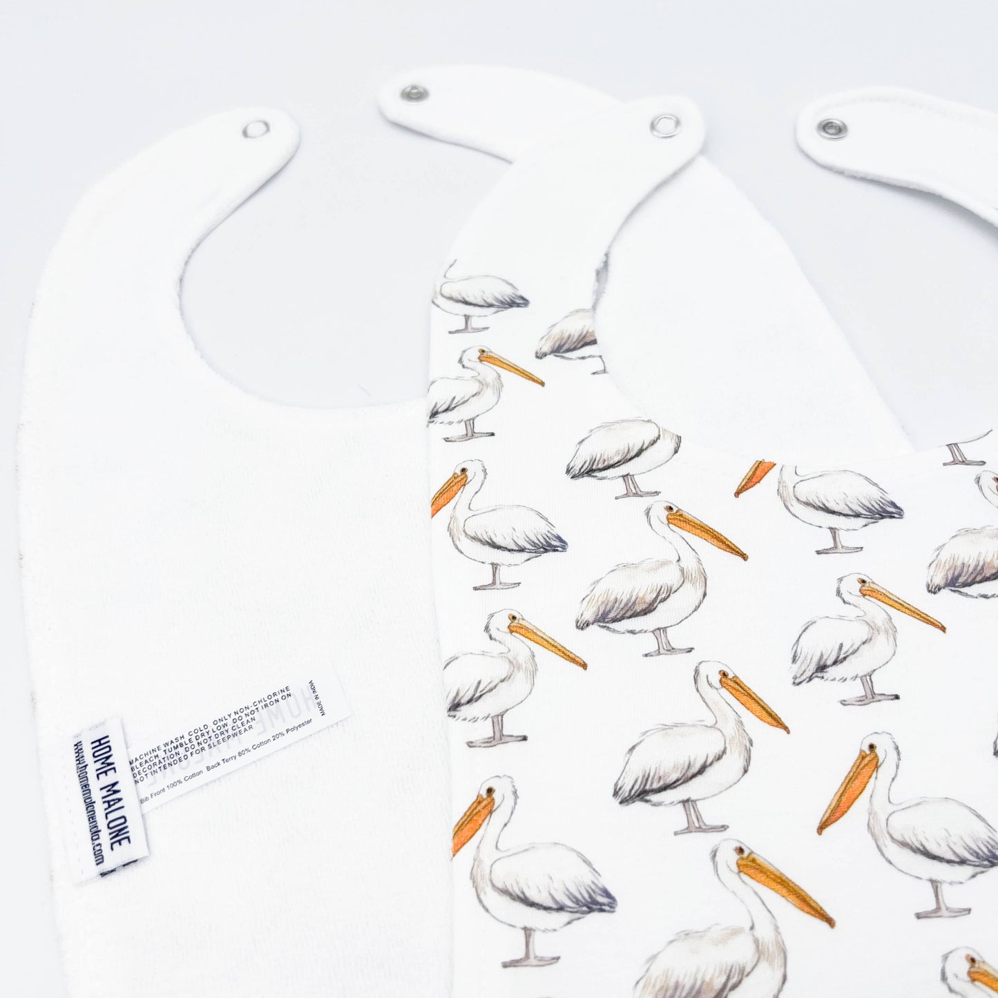 Pelican On White Baby Bib