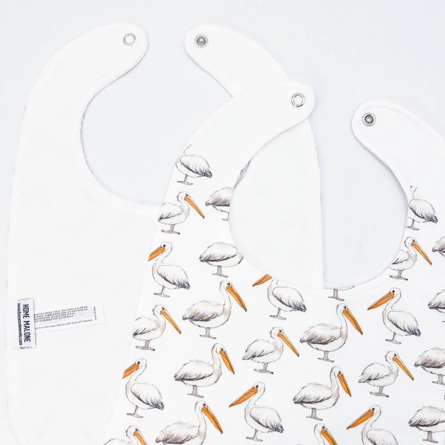Pelican On White Baby Bib